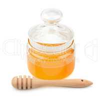 pot with honey and drizzler isolation on a white background