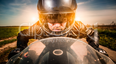 Biker racing on the road