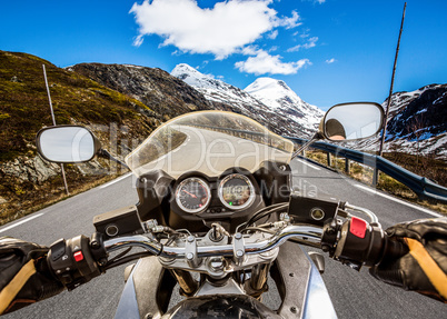 Biker First-person view, mountain serpentine.