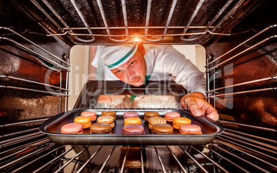 Chef cooking in the oven.