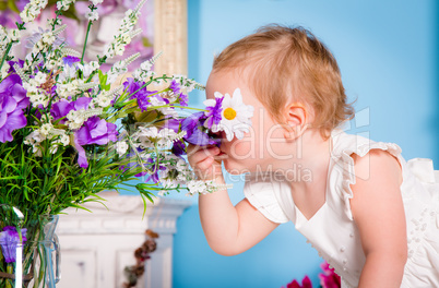 Little girl and flower