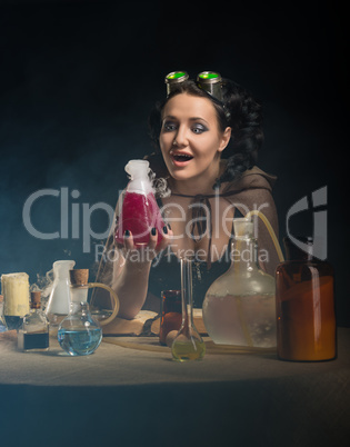 alchemist girl with test tubes in hand