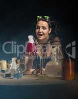 alchemist girl with test tubes in hand