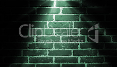 spot light green on brick wall