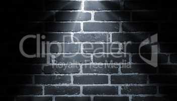 spot light on brick wall