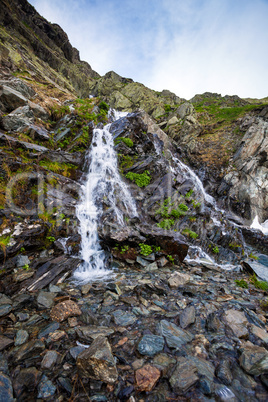 River watterfall flowing over rough rocks