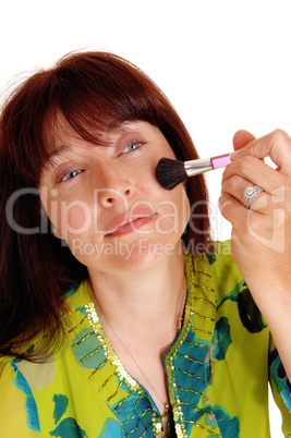 Woman putting makeup on her chic's.