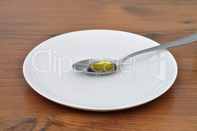 Olivenöl auf Loeffel