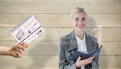 Composite image of businesswoman with diary