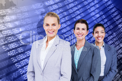 Composite image of smiling young businesswomen in a line