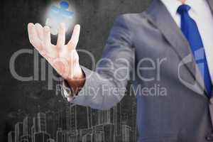 Composite image of businessman presenting with his hands