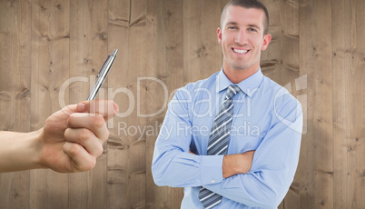 Composite image of smiling businessman