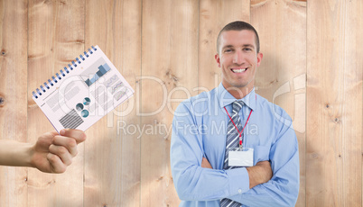 Composite image of smiling businessman