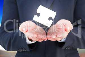 Composite image of close up of hand of a businessman