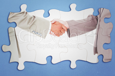 Composite image of side view of shaking hands Composite image of side view of shaking hands