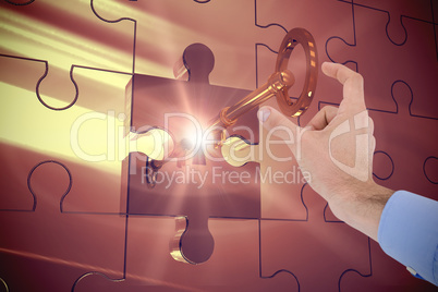 Composite image of businessman holding hand out in presentation Composite image of businessman holding hand out in presentation