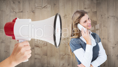 Composite image of happy blonde on the phone