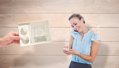 Composite image of smiling businesswoman having a phone call and