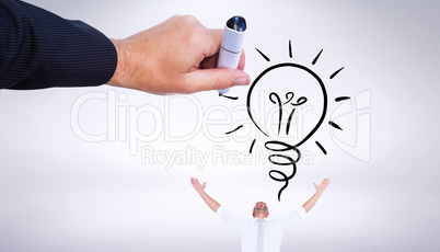 Composite image of hand drawing light bulb Composite image of hand drawing light bulb