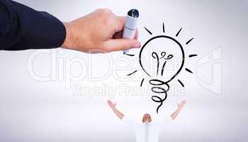 Composite image of hand drawing light bulb