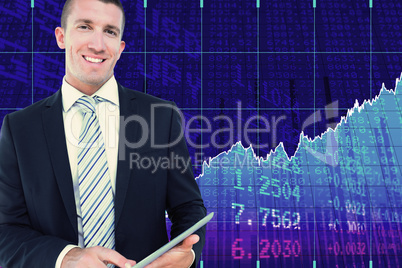 Composite image of businessman using tablet pc