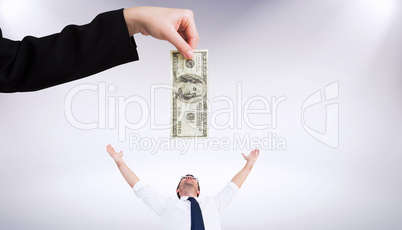 Composite image of businesswomans hand holding hundred dollar bi