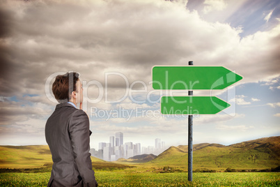 Composite image of thinking businessman