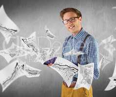 Composite image of geeky student reading a book