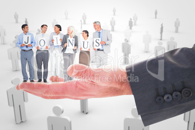 Composite image of business people holding letters sign