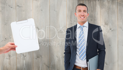 Composite image of happy businessman