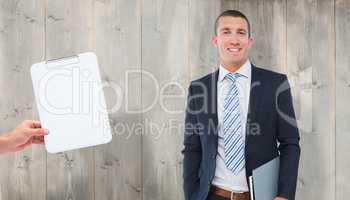 Composite image of happy businessman