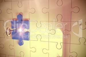 Key unlocking jigsaw