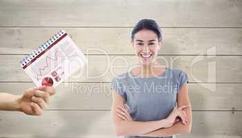 Composite image of smiling businesswoman with arms crossed