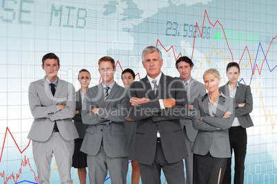 Composite image of business team standing arms crossed