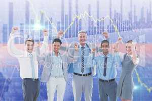 Composite image of business people cheering in office