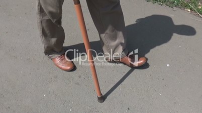 The man with the walking stick