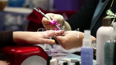 Manicure in spa salon, nails art painting in beauty salon