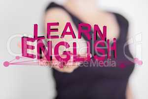 Hand holding lettering "LEARN ENGLISH"