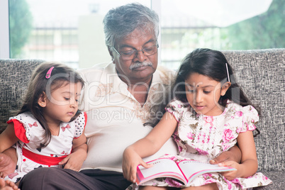 Family reading story book together