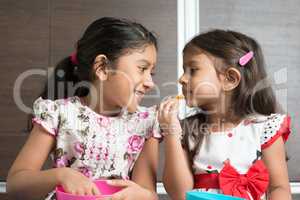 Sibling eating foods