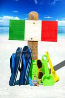 Holzschild mit Italien Flagge am Strand