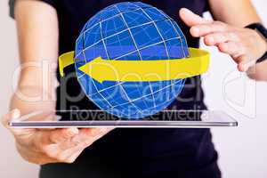 Hand holding tablet pc with sphere and band