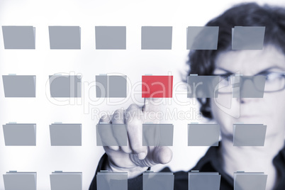 Woman typing on File Folder