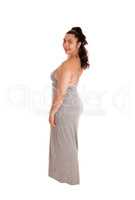 Beautiful woman in gray dress in full length.