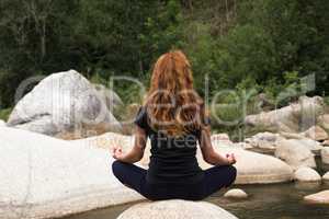 beautiful girl practices yoga