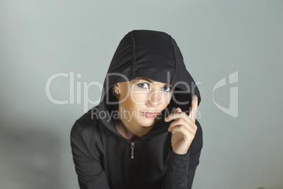 Beautiful girl in the hood with earrings