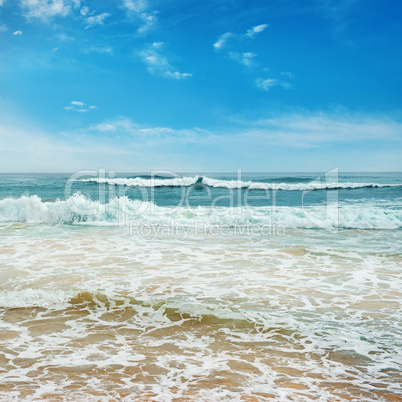 Ocean waves and blue sky