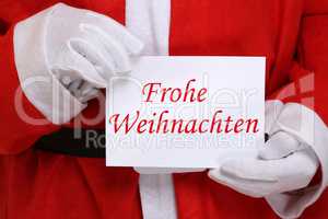 Frohe Weihnachten Weihnachtsmann Nikolaus hält Weihnachtskarte