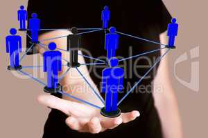 Woman holding network with human figures