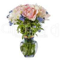 Bouquet of flowers in a vase, tulips and forget-me-not, isolated